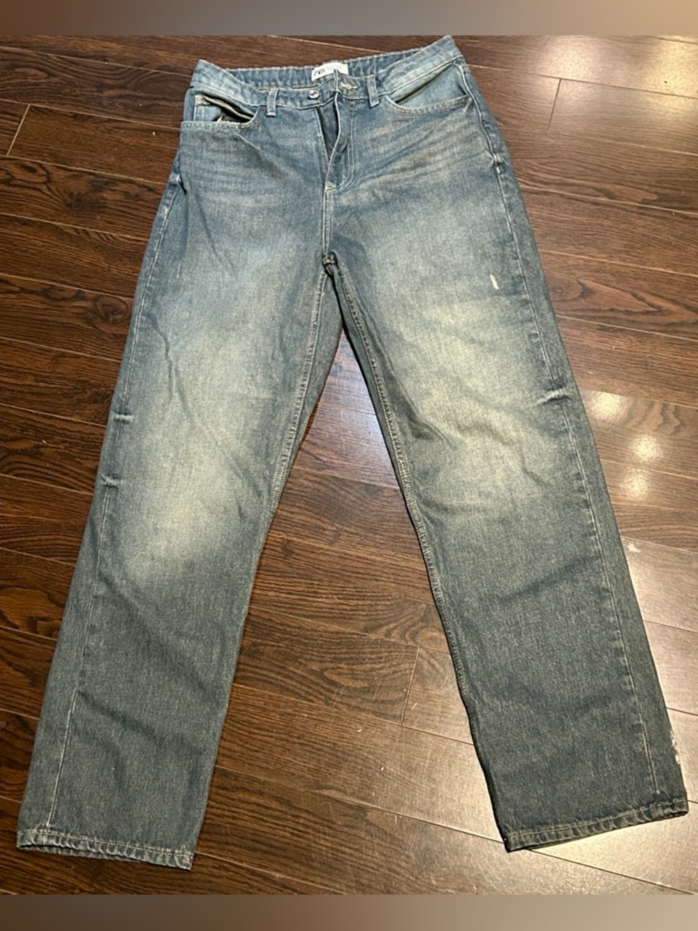 Zara new jeans, some distressing, size US 10. 10/10 condition. Faded legs, cozy